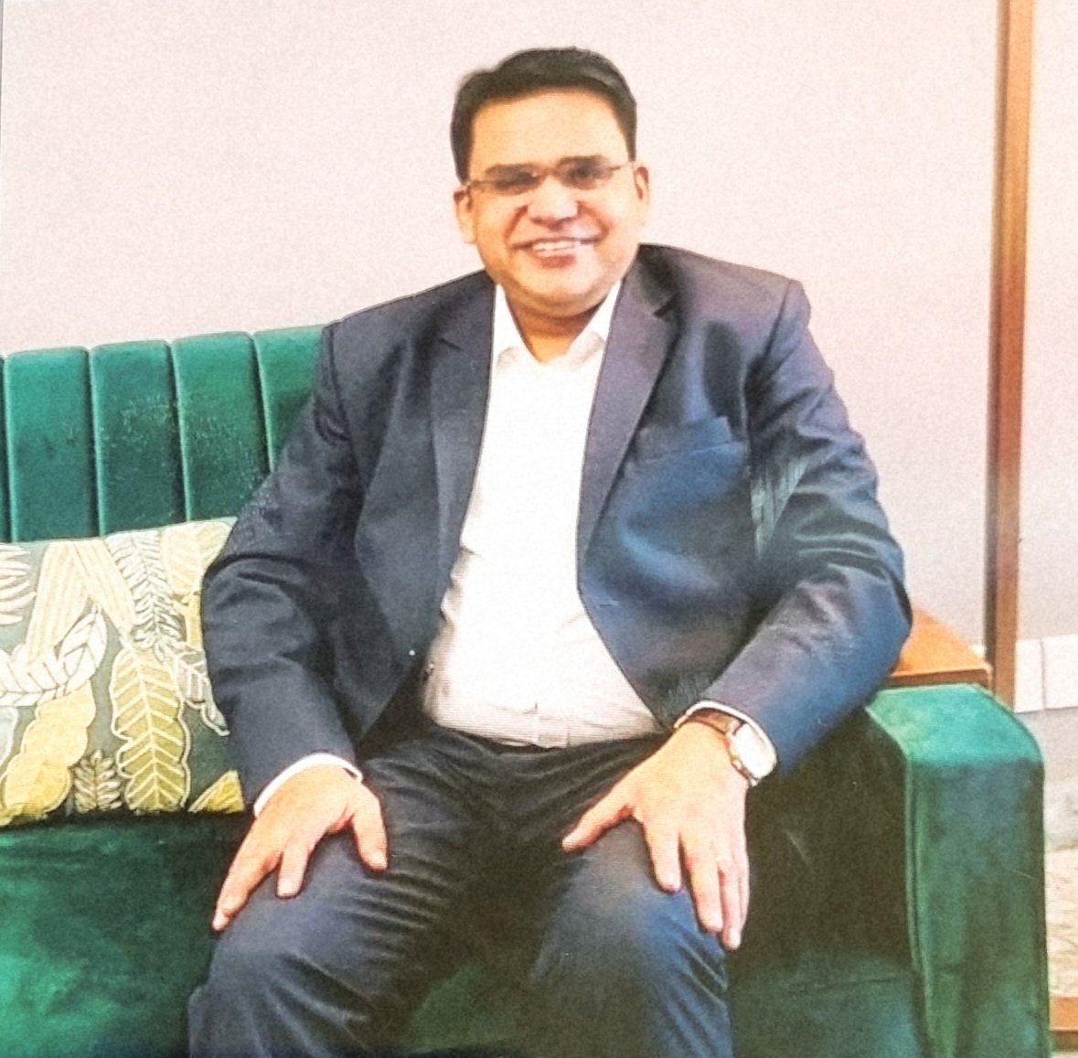 Dr. Manish Prasad